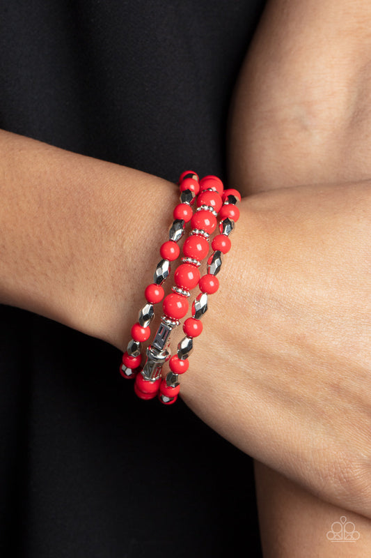 Colorfully Coiled - Red and Silver Coil Bracelet - Paparazzi Accessories - A mismatched collection of faceted silver beads, studded silver rings, and fiery red beads are threaded along a wire that coils around the wrist, creating a colorful infinity wrap style bracelet. Sold as one individual bracelet.