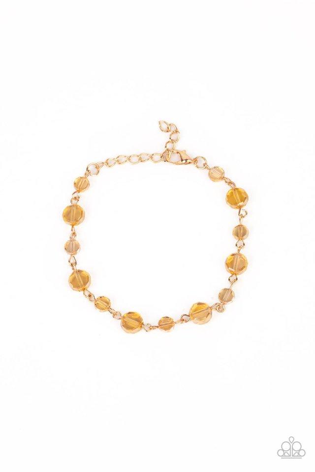 Cosmic - Gold Iridescent - Bracelet - Paparazzi Accessories - 
Dipped in a rainbow iridescence, a faceted collection of golden crystal-like beads delicately links around the wrist for a stellar pop of color. Features an adjustable clasp closure. Charming gold faceted beads link between golden metal to delicately hang.
