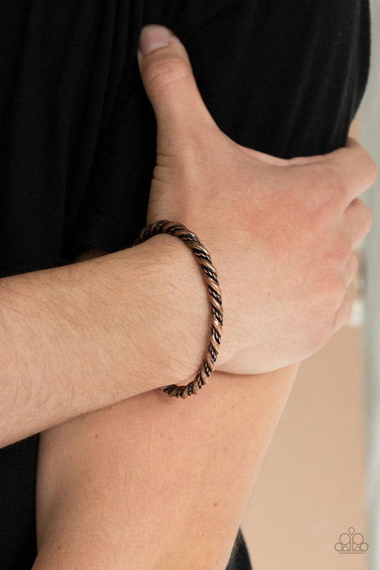 Combat Ready - Copper Mens Bracelet - Paparazzi Accessories - Mismatched antiqued copper bars twist around the wrist, creating an edgy cuff. Sold as one individual bracelet.