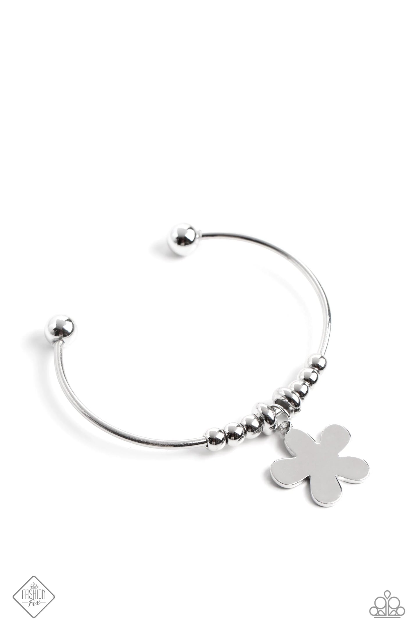 Comber Canvas - Silver Flower Cuff Bracelet - Paparazzi Accessories - A skinny silver bar is capped in barbell fittings, allowing a collection of sleek silver beads and a psychedelic flower in a high-sheen finish to slide along its surface as it arcs across the wrist. Sold as one individual bracelet.