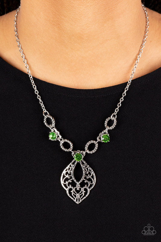 Contemporary Connections - Green and Silver Necklace - Paparazzi Accessories - Twisted silver links and oversized green rhinestones delicately alternate below the collar. A hammered filigree filled silver pendant shimmers from the bottom of the centermost rhinestone, creating a contemporary pendant. Features an adjustable clasp closure.