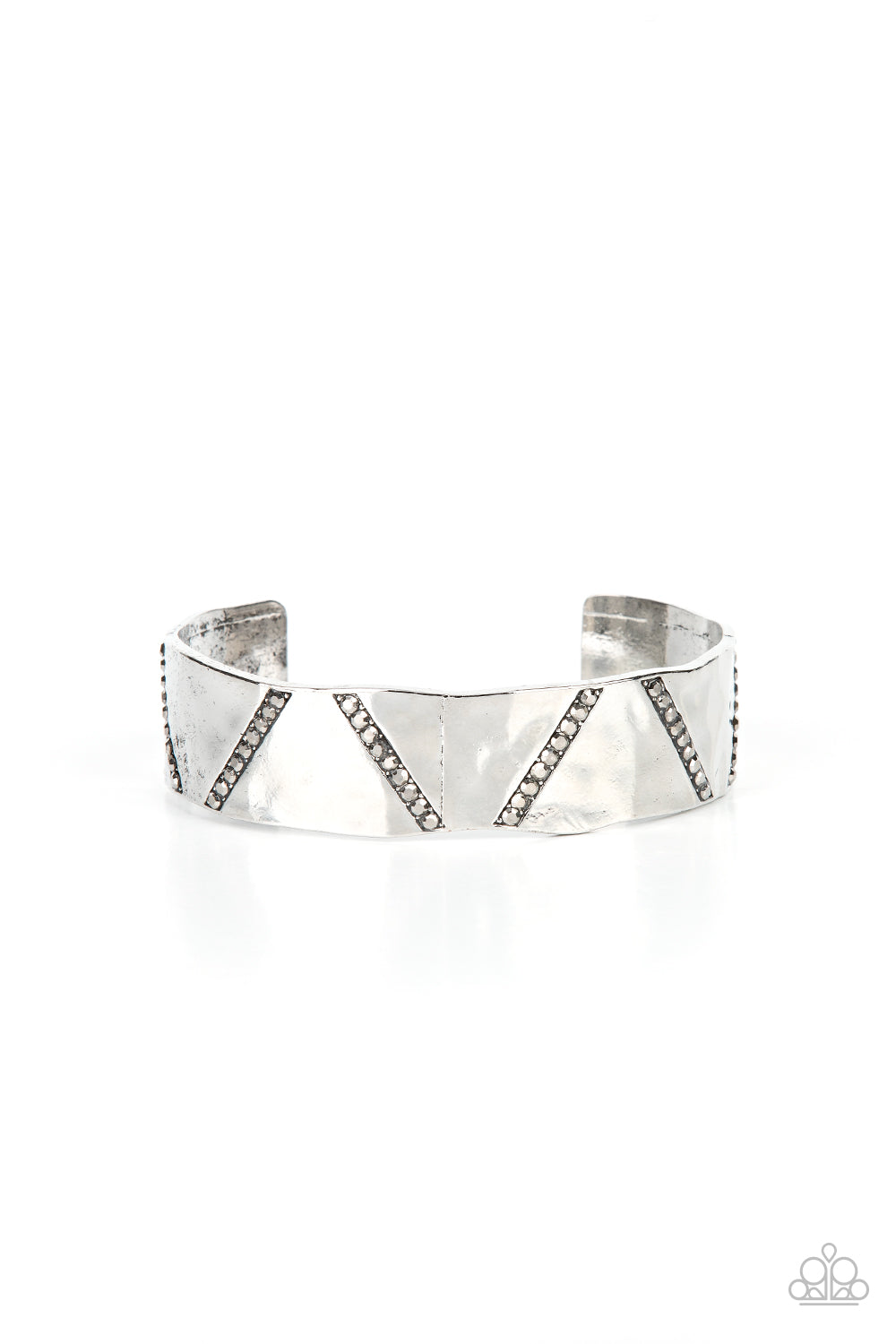 Couture Crusher - Silver Cuff Bracelet - Paparazzi Accessories - Rows of smoky hematite rhinestones slant across the front of a gently hammered silver cuff that waves around the wrist, result in an edgy shimmer. Sold as one individual bracelet.