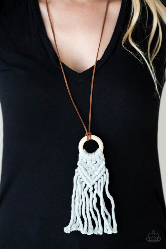 Crafty Couture - Silver Macrame Fashion Necklace - Paparazzi Accessories - Strands of gray yarn-like thread delicately weaves into a knotted macrame pattern at the bottom of a white wooden hoop. Dainty strands of brown suede knot around the pendant for an earthy flair. Features an adjustable clasp closure.