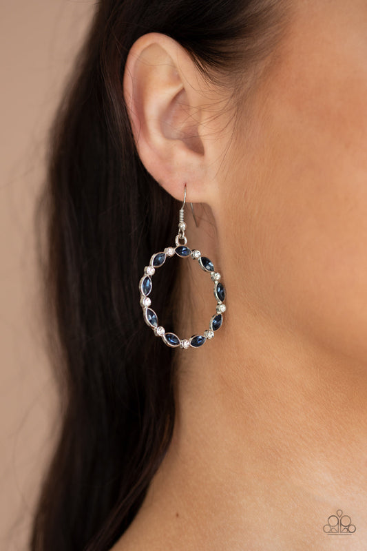 Crystal Circlets - Blue and Silver Gem Earrings - Paparazzi Jewelry - Bejeweled Accessories By Kristie - Encased in sleek silver frames, dainty white rhinestones and blue marquise gems delicately connect into a glittery hoop for a glamorous finish. Earring attaches to a standard fishhook fitting. Sold as one pair of earrings.