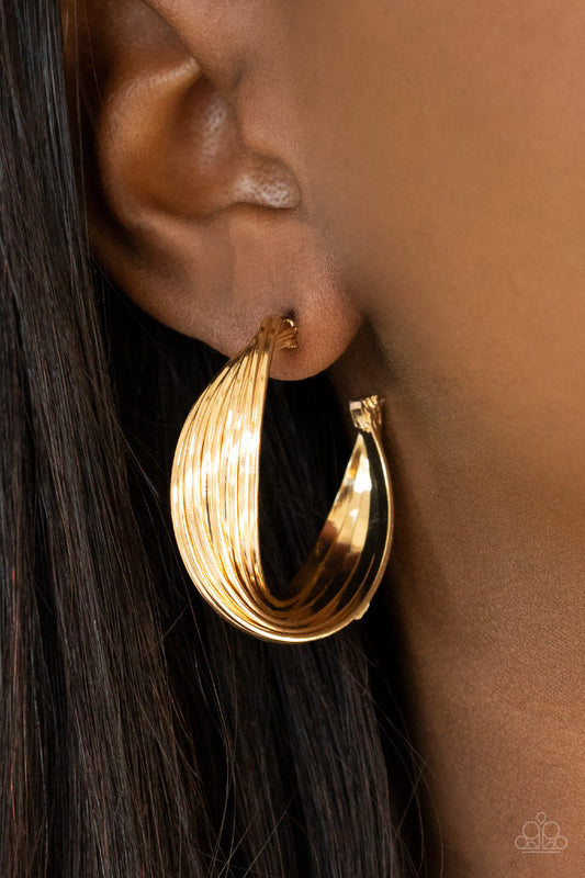 Curves In All The Right Places - Gold Hoop Earrings - Paparazzi Accessories - Stack of shiny gold hoops twist at the center, creating a curvaceous display. Earring attaches to a standard post fitting. Hoop measures approximately 1 1/4" in diameter.