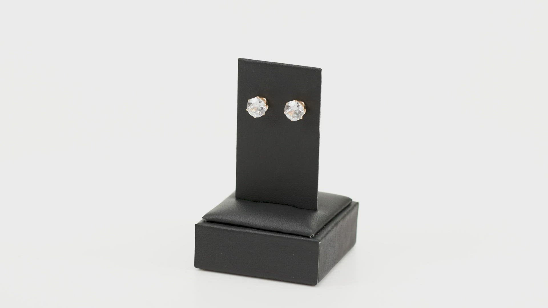 Just In TIMELESS - Gold Earrings - Paparazzi Accessories 
A sparkling white rhinestone is nestled inside a classic gold frame for a timeless look. Earring attaches to a standard post fitting. Sold as one pair of post earrings.
