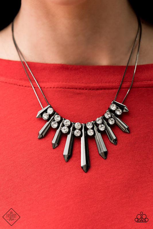 Dangerous Dazzle - Black - Gunmetal Necklace - Paparazzi Accessories - Glittery white rhinestones alternate between flared gunmetal rods that are threaded along two rows of gunmetal chains, creating a dazzling fringe below the collar. Features an adjustable clasp closure.