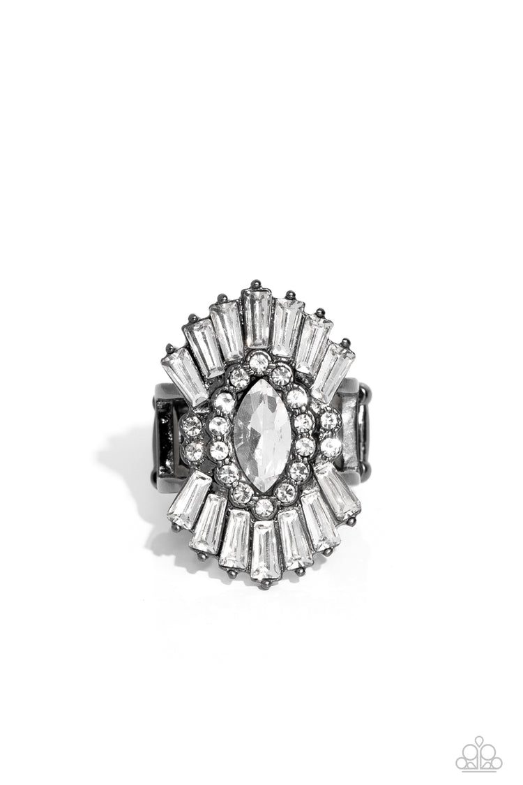 Daringly Deco - Black Ring - Paparazzi Jewelry  - Bejeweled Accessories By Kristie - A white, marquise-cut rhinestone is bordered in glassy white rhinestones atop fans of trapezoidal-cut white rhinestones, resulting in an edgy sparkle that explodes atop the finger. Features a stretchy band for a flexible fit.