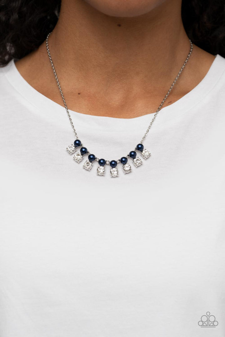 Dashingly Duchess - Blue Pearl and Silver Necklace - Paparazzi Accessories - Encased in sleek silver fittings, pairs of blue pearls and white rhinestones elegantly stack below the collar for a romantically refined flair. Features an adjustable clasp clos