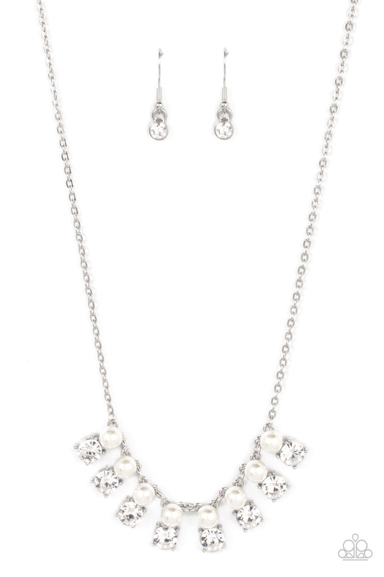 Dashingly Duchess - Pearl and Silver Necklace - Paparazzi Accessories - Encased in sleek silver fittings, pairs of white pearls and white rhinestones elegantly stack below the collar for a romantically refined flair. Features an adjustable clasp closure.