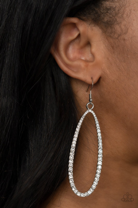 Dazzling Decorum - White and Silver Earrings - Paparazzi Accessories - 
The front of a lengthened silver oval frame is encrusted in glittery white rhinestones, creating a glamorous centerpiece. Earring attaches to a standard fishhook fitting. Sold as one pair of earrings.
