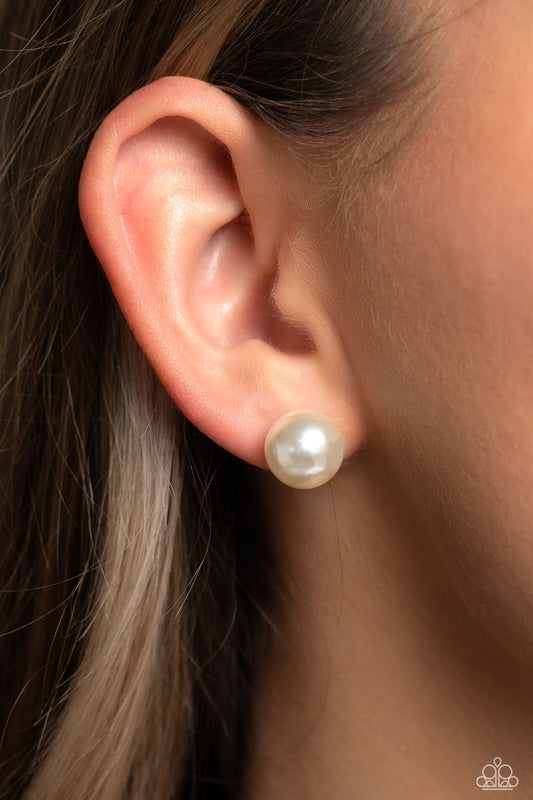 Debutante Details - White Pearl Earrings - Paparazzi Accessories - An oversized white pearl, stands out against the ear adding a timeless twist to a basic staple piece perfect for layering. Earring attaches to a standard post fitting. Sold as one pair of post earrings.