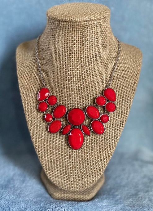Demi-Diva - Red and Silver Necklace - Paparazzi Accessories - Bold red and silver fashion necklace. Featuring regal teardrop, oval, round and marquise style cuts, glittery red gems coalesce into a glittery pendant below the collar, creating a knockout pendant. Features an adjustable clasp closure. Sold as one individual necklace.