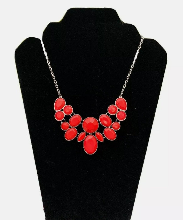 Demi-Diva Red and Silver Necklace - Paparazzi Accessories - Bold red and silver fashion necklace. Featuring regal teardrop, oval, round and marquise style cuts, glittery red gems coalesce into a glittery pendant below the collar, creating a knockout pendant.