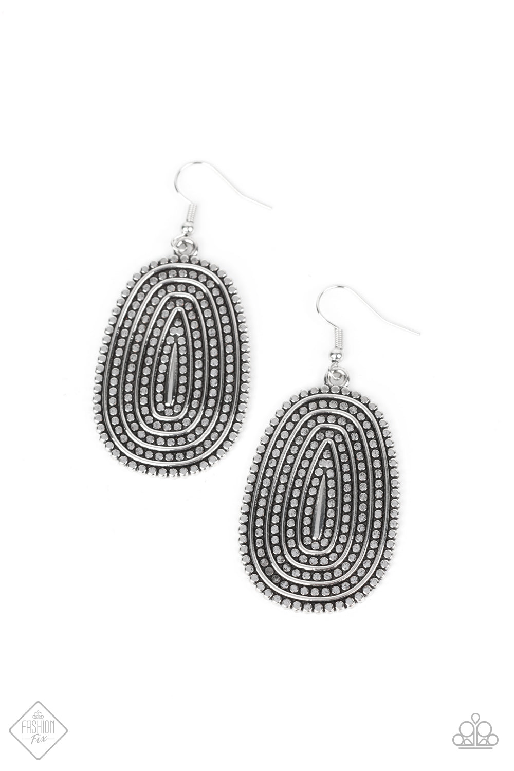 ​Desert Climate - Silver Earrings - Paparazzi Accessories - 
Rows of antiqued silver dotted texture radiate outward from an embossed center. The concentric lines create a rippling effect across the frame resulting in a rustic finish. Earring attaches to a standard fishhook fitting. Sold as one pair of earrings.
