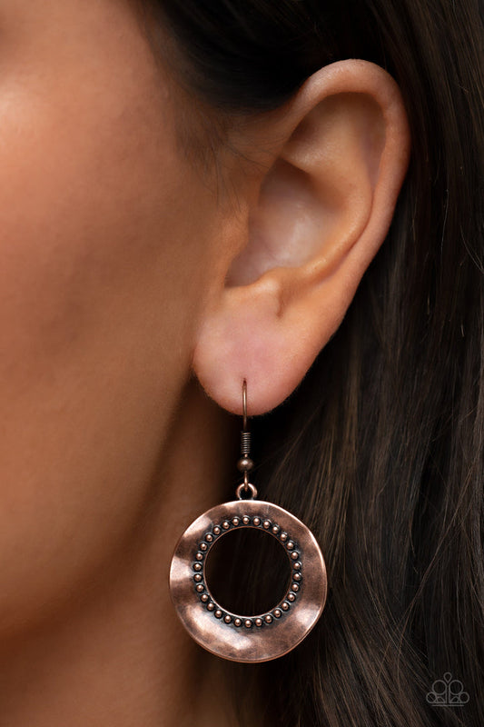 Desert Diversity - Copper Brown Earrings - Brushed in a burnished finish, a warped copper disc ripples around a studded copper center for a rustic flair. Earring attaches to a standard fishhook fitting.