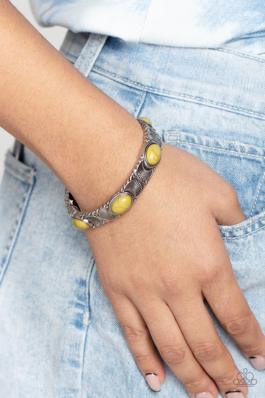 ​Desert Skyline - Yellow Stone - Silver Bracelet - Paparazzi Accessories - 
Flanked by silver half moon accents, Willow stone dotted silver frames are threaded along stretchy bands around the wrist for a rustic flair. Sold as one individual bracelet.
