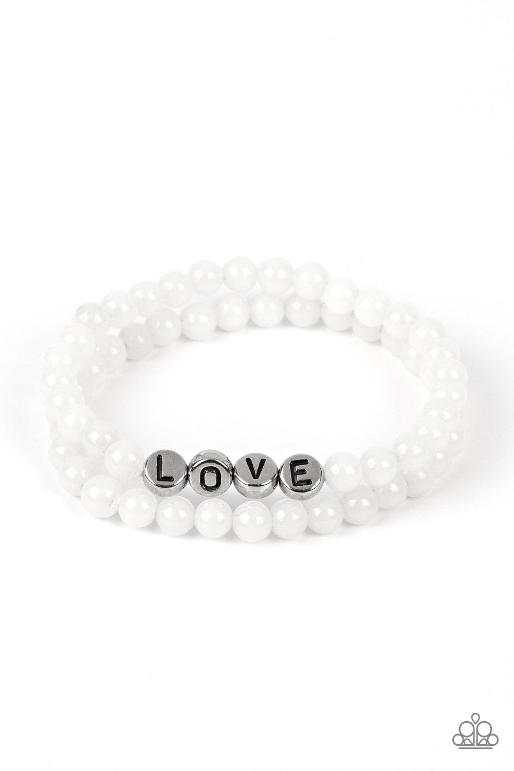 Devoted Dreamer - White and Silver Bracelet - Paparazzi Accessories - Cloudy beads in subtle shades of white extend around the wrist on elastic stretchy bands for a two-for-one romantic stack. Centered on one of the white bracelets, silver discs stamped with individual black letters spell out the word "love." Sold as one individual bracelet.