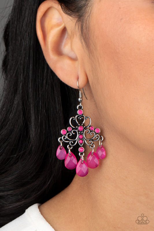 Dip It GLOW - Pink and Silver Earrings - Paparazzi Accessories - Cloudy pink teardrops swing from the bottom of an ornate silver frame radiating with dainty pink rhinestones for a whimsical look. Earring attaches to a standard fishhook fitting. Sold as one pair of earrings.