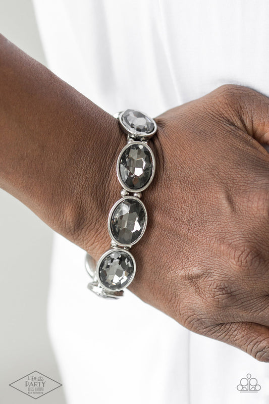 DIVA In Disguise - Smoky Gray Gem - Silver Stretchy Bracelet - Smoky gems in sleek silver frames. Stylish bracelet has dainty silver beads, the glittery frames are threaded along stretchy elastic bands for a glamorous look around the wrist. Bejeweled Accessories By Kristie - Trendy fashion jewelry for everyone -