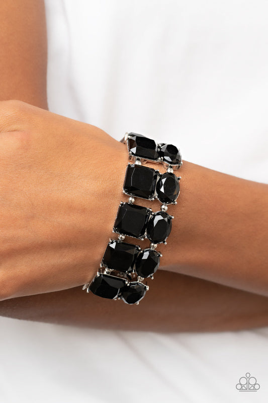 Dont Forget Your Toga - Black Bead - Silver Stretchy Bracelet - Paparazzi Accessories - Separated by pairs of dainty silver beads, faceted stacks of oval and square cut black beads are threaded along a stretchy band around the wrist for a bold pop of color.