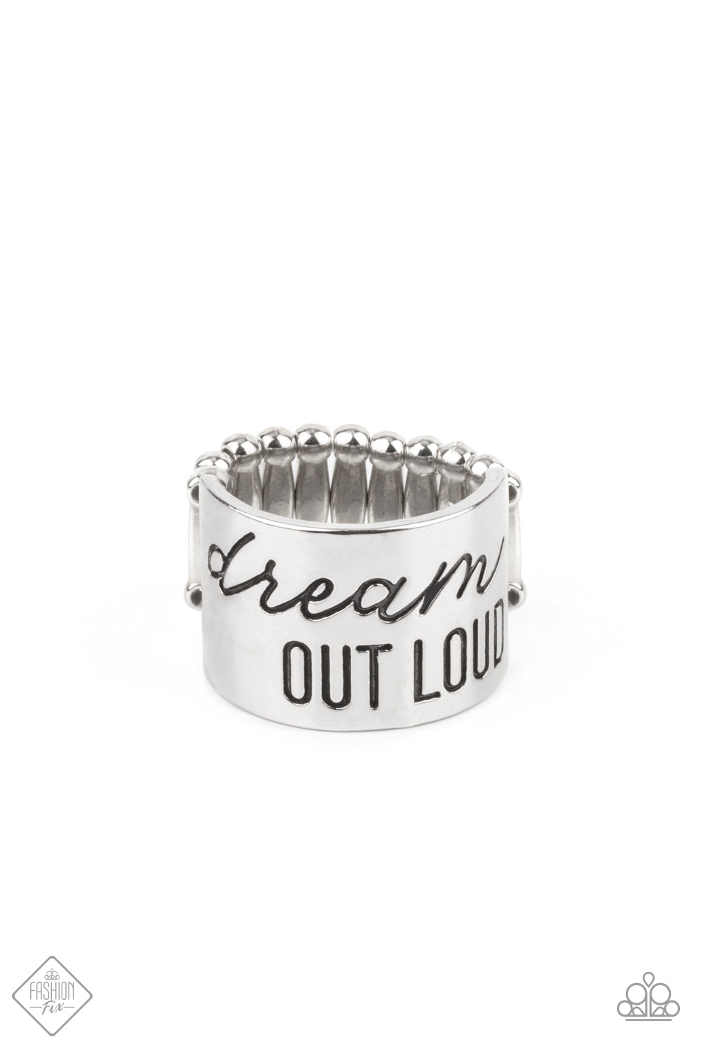 ​Dream Louder - Dream Out Loud - Silver Ring - Paparazzi Accessories - 
The front of a thick silver band is stamped in the phrase, "Dream out loud," creating an inspirational centerpiece across the finger. Features a stretchy band for a flexible fit.
Sold as one individual ring.
