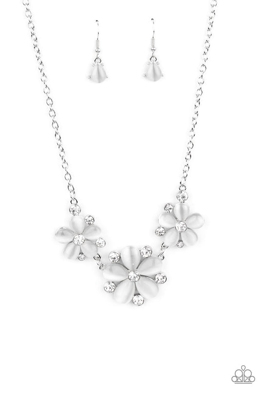 Effortlessly Efflorescent - White Cat's Eye Stone and Silver Necklace - Paparazzi Accessories - Dotted with glassy white rhinestone centers, a trio of white cat's eye stone petaled flowers blossom below the collar for an enchanted look. Features an adjustable clasp closure. Sold as one individual necklace.