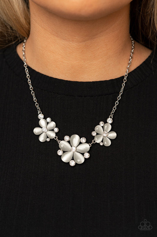 Effortlessly Efflorescent - White Cat's Eye Stone and Silver Necklace - Paparazzi Accessories - Dotted with glassy white rhinestone centers, a trio of white cat's eye stone petaled flowers blossom below the collar for an enchanted look. Features an adjustable clasp closure. Sold as one individual necklace.