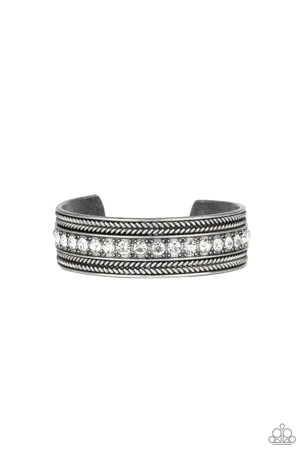 Empress Etiquette - White and Silver Cuff Bracelet - Paparazzi Accessories - A row of glittery white rhinestones line the center of a studded silver cuff for an edgy look. Sold as one individual bracelet.