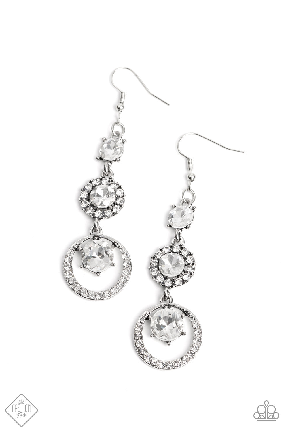 Enchanting Effulgence - White Gem and Silver Earrings - Paparazzi Accessories - A glamorous collection of brilliant, round, white gems drip down the ear, creating an irresistibly refined lure. The topmost gem features pronged fittings, followed by the center gem that is bordered by a halo of dainty white rhinestones for additional eye-catching shimmer. Encircling the lower-most gem, an airy, rhinestone-encrusted hoop completes the dazzling design.