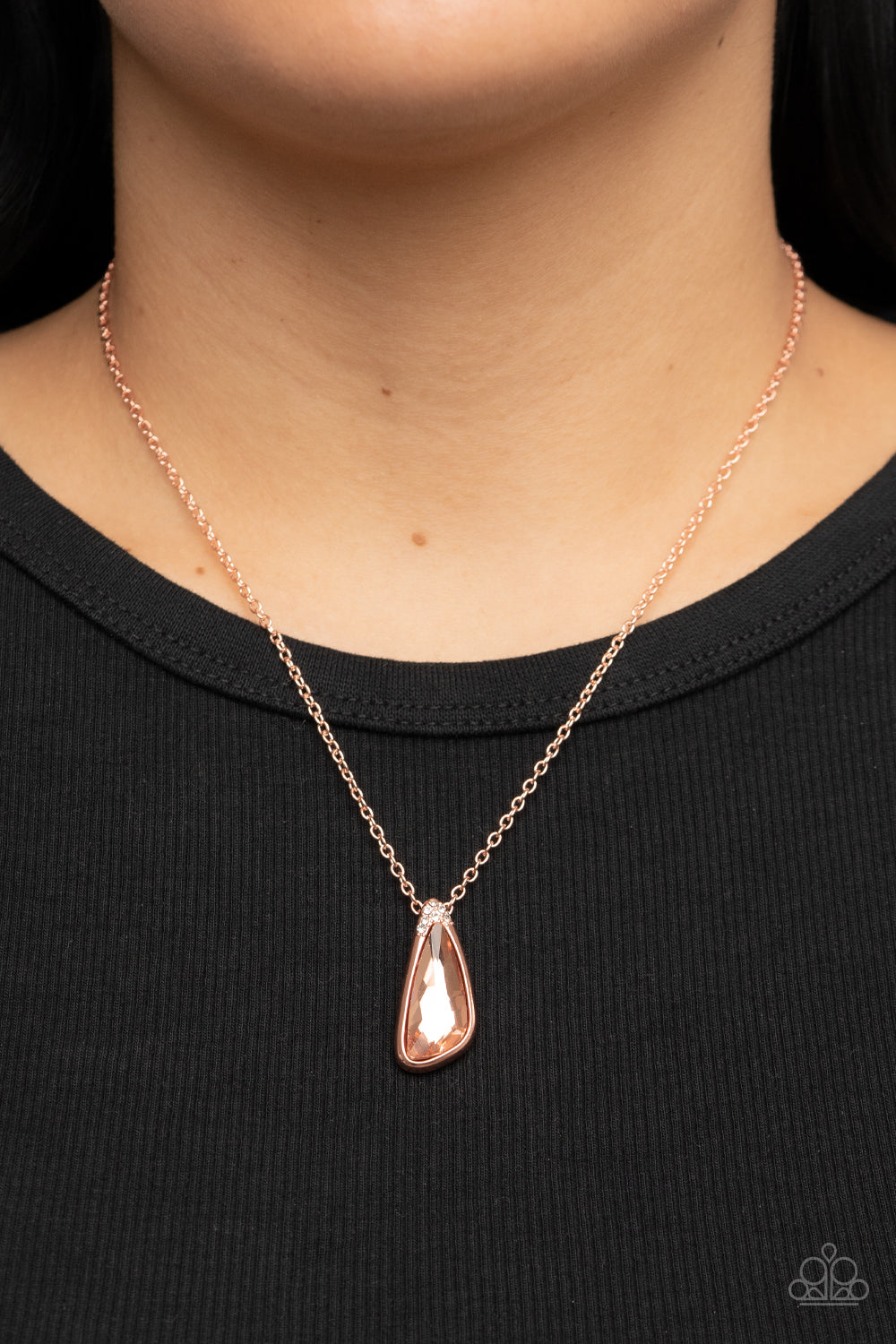 Envious Extravagance - Copper Gem Fashion Necklace - Paparazzi Accessories - An asymmetrical coppery gem is pressed into a shiny copper frame dusted in glassy white rhinestones, resulting in a refined pendant at the bottom of a dainty shiny copper chain. Features an adjustable clasp closure.