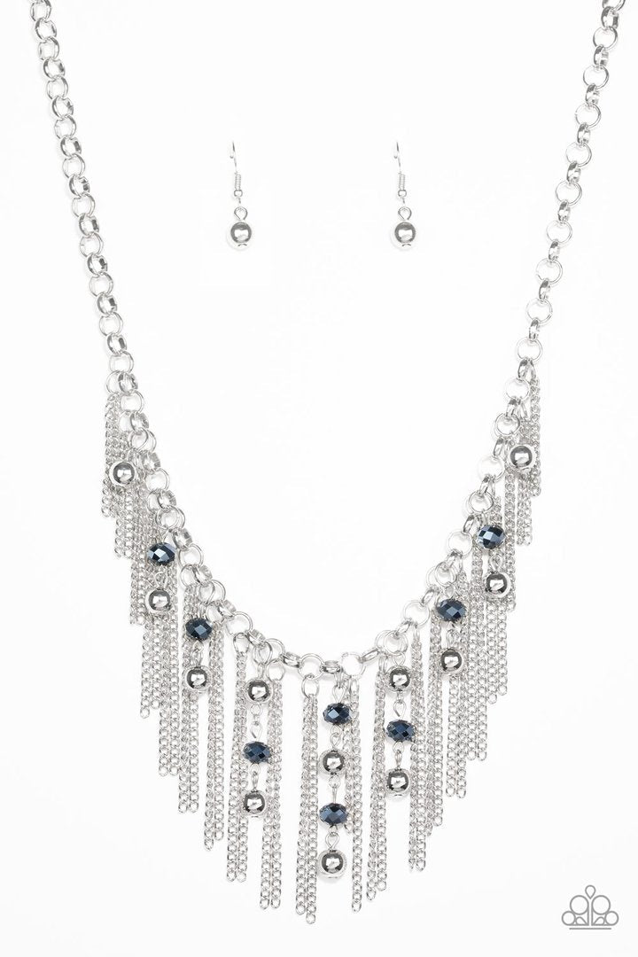 Ever Rebellious - Blue and Silver Necklace - Paparazzi Accessories - Glistening silver chains and strands of metallic blue crystal-like beads and glistening silver beads stream from the bottom of a bold silver chain, creating a sassy fringe below the collar. Features an adjustable clasp closure. Sold as one individual necklace.