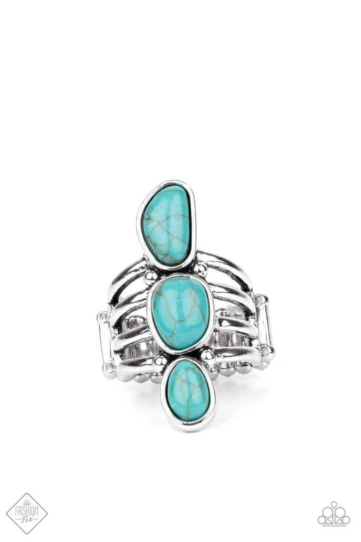Extra Eco - Blue Turquoise and Silver Ring - Paparazzi Accessories - Encased in sleek silver frames, a row of turquoise stones coalesce into a unique handcrafted centerpiece atop layered silver bands. Features a stretchy band for a flexible fit. Sold as one individual earthy fashion ring.