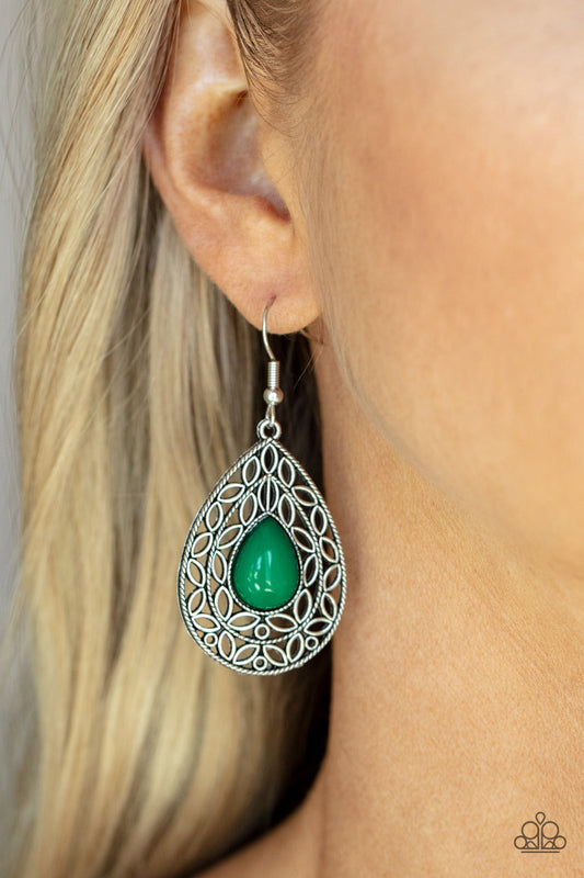 Fanciful Droplets - Green and Silver Earrings - Paparazzi Accessories - Fanciful teardrop frames filled with a charming leaf motif filigree envelop a bright Leprechaun teardrop bead creating a captivating lure. Earring attaches to a standard fishhook fitting. Sold as one pair of earrings.