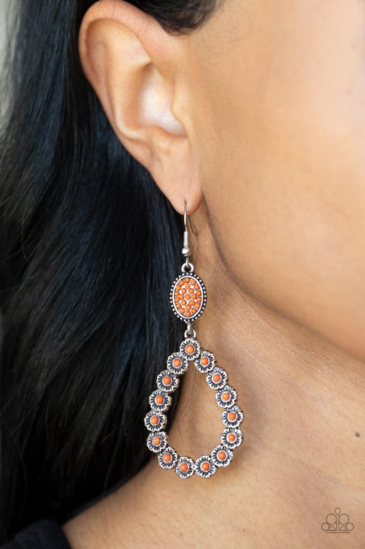 Farmhouse Fashion Show - Orange and Silver Earrings - Paparazzi Accessories - Dotted with dainty orange beaded centers, rustic silver floral frames delicately connect into a whimsical teardrop at the bottom of a matching orange beaded oval frame. Earring attaches to a standard fishhook fitting. Sold as one pair of earrings.
