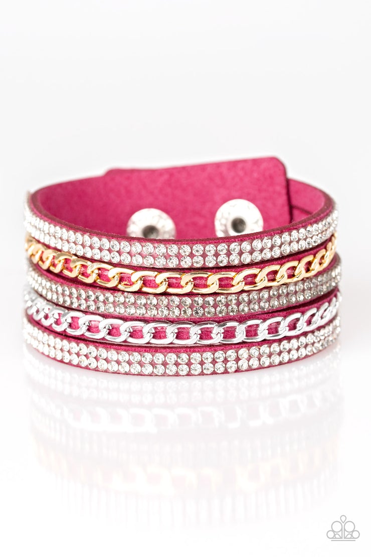 Fashion Fiend - Pink Suede Bracelet - Paparazzi Accessories - Glassy white and smoky rhinestones are encrusted along strands of pink suede. Glistening silver and gold chains are added to the bands, adding edgy industrial shimmer to the sassy palette. Features an adjustable snap closure stylish bracelet. Bejeweled Accessories By Kristie - Trendy fashion jewelry for everyone -