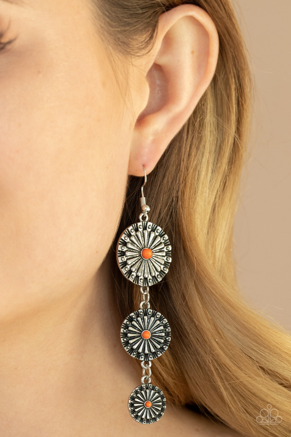 Festively Floral - Orange and Silver Earrings - Paparazzi Accessories - Dotted with dainty orange beads, rustic silver floral frames gradually decrease in size as they swing from the ear, creating a colorful lure. Earring attaches to a standard fishhook fitting. Sold as one pair of earrings.