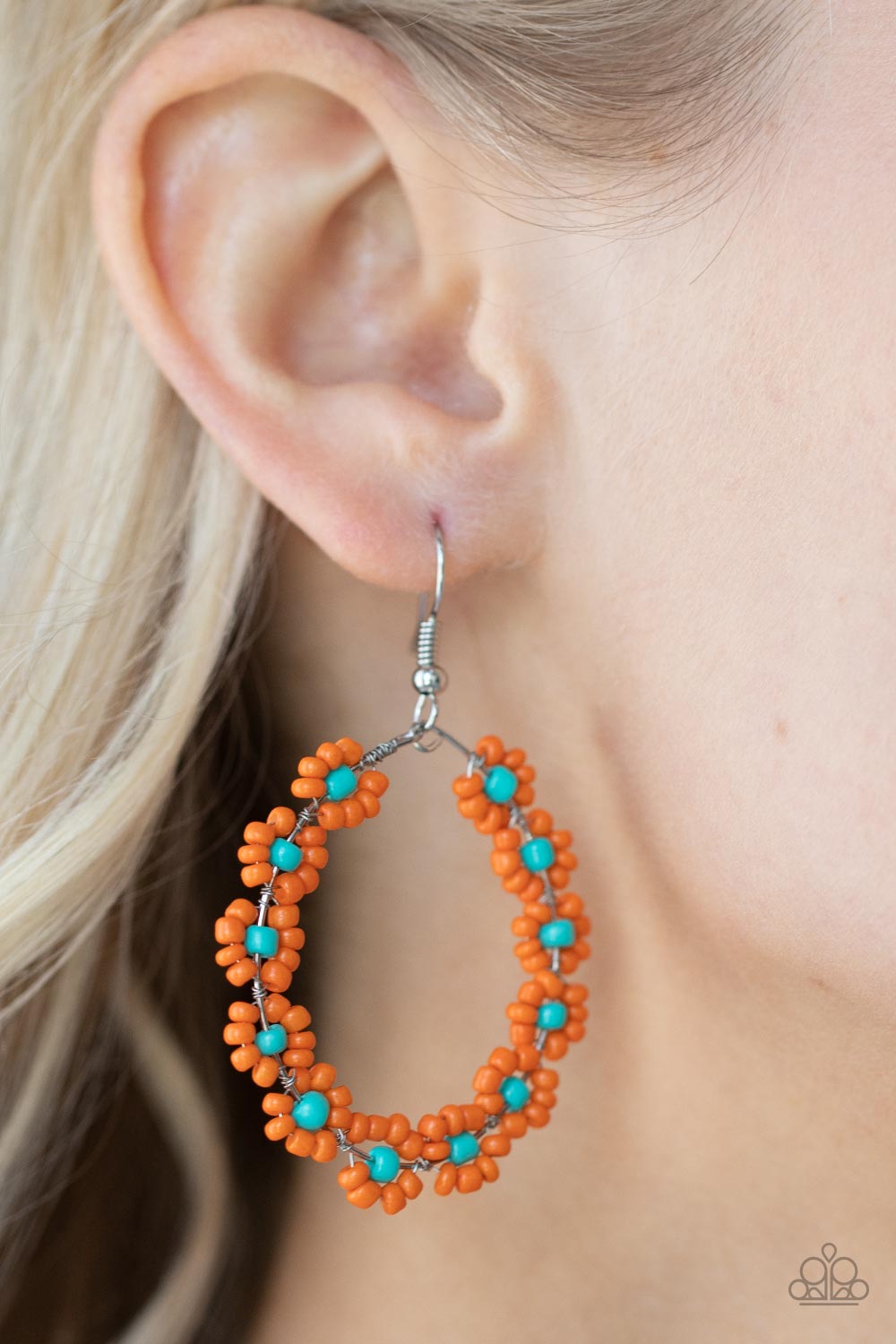 Festively Flower Child - Orange - Blue Seed Bead Earrings - Paparazzi Accessories - Dotted with turquoise beaded centers, a dainty collection of orange seed beaded floral frames are threaded along a wire hoop for a fabulous floral fashion. Earring attaches to a standard fishhook fitting. 