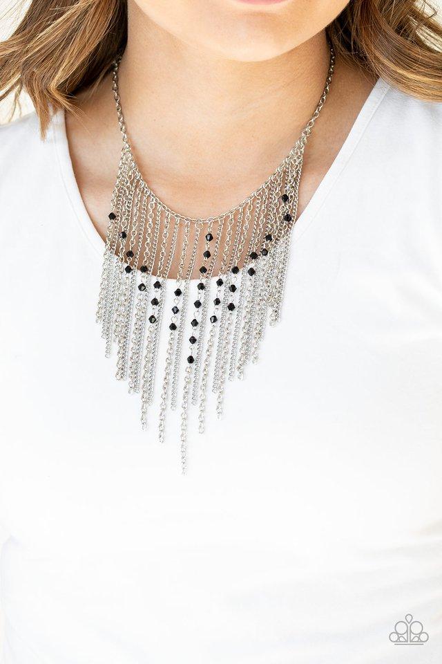 First Class Fringe - Black and Silver Necklace & Earrings - Paparazzi Accessories - 
Varying in length, mismatched silver chains stream from the bottom of a classic silver chain. Faceted black crystal-like beads sporadically dot the free-falling chains, creating a statement-making fringe below the collar. Features an adjustable clasp closure. Sold as one individual necklace. Includes one pair of matching earrings.
