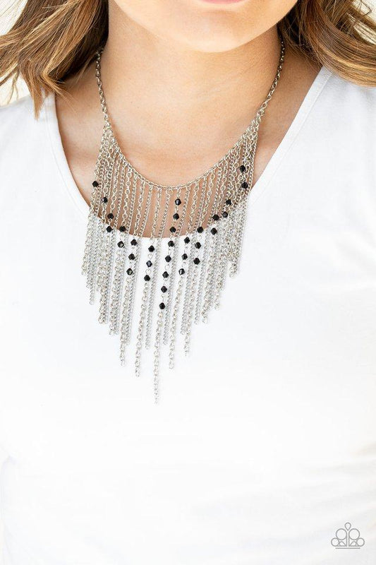 First Class Fringe - Black and Silver Necklace & Earrings - Paparazzi Accessories - Varying in length, mismatched silver chains stream from the bottom of a classic silver chain. Faceted black crystal-like beads sporadically dot the free-falling chains, creating a statement-making fringe below the collar.