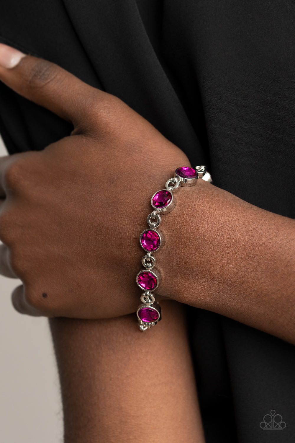 First In Fashion Show - Pink and Silver Bracelet - Paparazzi Accessories - Classic pink rhinestone encrusted silver frames delicately link around the wrist, creating a timeless centerpiece. Features an adjustable clasp closure. Sold as one individual bracelet.