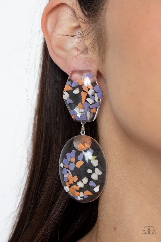 Flaky Fashion - Orange - Purple - White Acrylic Earrings - Paparazzi Accessories - Featuring multicolored confetti-like flakes, a clear acrylic oval frame swings from the bottom of a matching hexagonal frame, creating a bubbly lure.