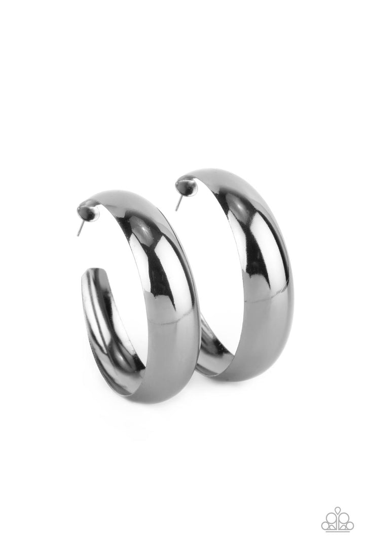 Flat Out Flawless - Black Metal Hoop Earrings - Paparazzi Accessories - An oversized flat gunmetal hoop curls around the ear for a fabulously flawless fashion. Earring attaches to a standard post fitting. Hoop measures approximately 2" in diameter. Sold as one pair of hoop earrings.