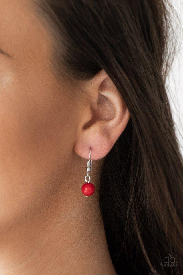 Flirty Foxtrot - Red and Silver Necklace - Paparazzi Accessories - 
Smooth and hammered silver rings join clusters of fiery red beads along a shimmery silver chain for a colorful look. Features an adjustable clasp closure.
