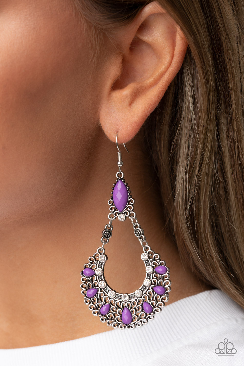 Fluent in Florals - Purple and Silver Fashion Earrings - Paparazzi Accessories - Purple beads and dainty white rhinestones, a filigree filled silver wreath swings from the bottom of a matching purple bead for a whimsical fashion. Earring attaches to a standard fishhook fitting. 