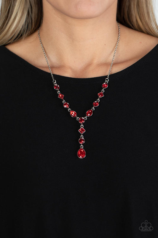 Forget the Crown - Red and Silver Necklace - Paparazzi Accessories - Brilliant red round-cut rhinestones alternate between diamonds and teardrops with a rich red finish, creating an elegant lariat fit for royalty. Features an adjustable clasp closure. Sold as one individual necklace.