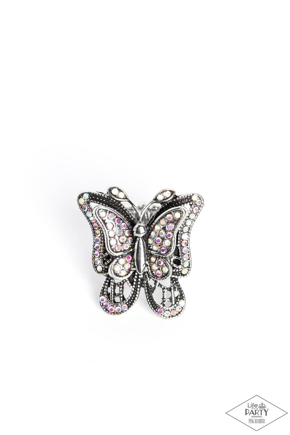 Free To Fly - Multi Color Iridescent - Butterfly Ring - Paparazzi Accessories - Dazzling iridescent rhinestones are sprinkled across the wings of a silver butterfly, creating a whimsical frame atop the finger. Features a stretchy band for a flexible fit.