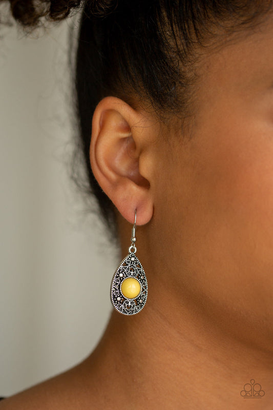 From POP To Bottom - Yellow and Silver Earrings - Paparazzi Accessories - A shiny yellow bead is pressed into the center of a silver studded teardrop frame for a perfect pop of color. Earring attaches to a standard fishhook fitting. Sold as one pair of earrings. 