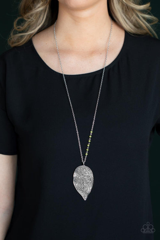 Frond Fantasy - Yellow and Silver Leaf Necklace - Paparazzi Accessories - Lengthened silver chain is dotted in dainty Illuminating crystal-like beads as it gives way to an oversized leaf pendant embossed in lifelike textures for a seasonal fashion necklace.