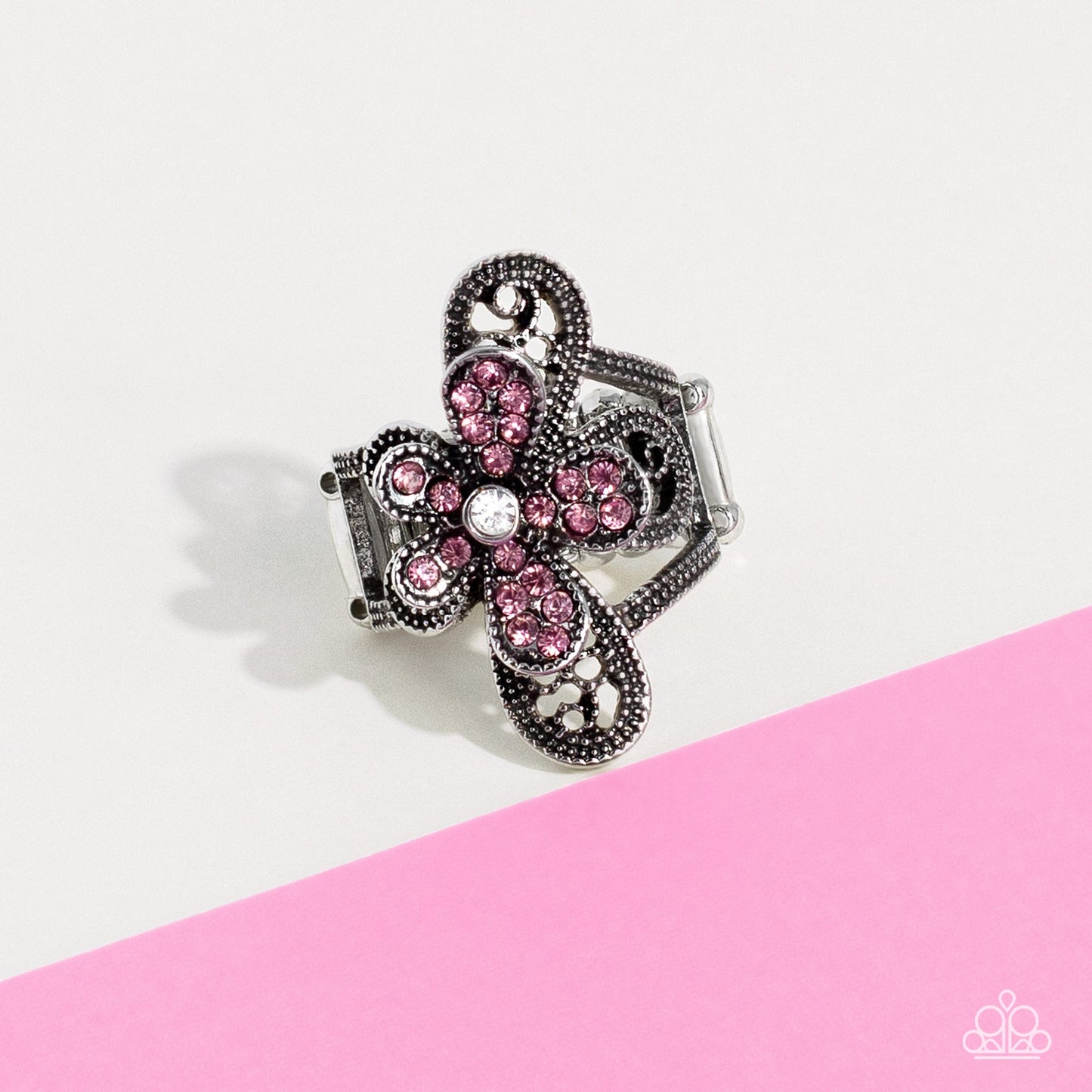 Garden Escapade - Pink and Silver Ring - Paparazzi Accessories - Dotted with a dainty white rhinestone center, silver petals overlaid with glittery pink rhinestones, sit atop studded silver filigree petals, creating a frilly floral centerpiece atop the finger.